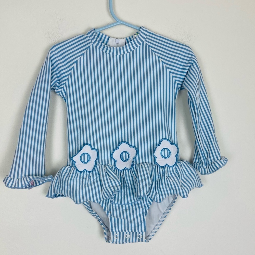 Classic Whimsy long sleeve blue and white seersucker swimsuit w/ daisy appliqué